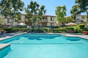 Fullerton apartment for rent - the swimming pool at the falls at rolland park apartments tx
