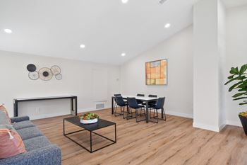 Community clubhouse with tv, living & dining areas