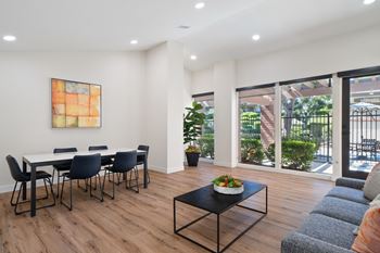 Community clubhouse with tv, living & dining areas