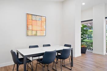 Community clubhouse with tv, living & dining areas