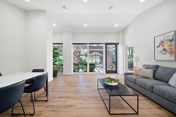 Community clubhouse with tv, living & dining areas