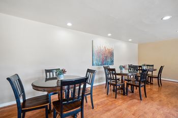 Community clubhouse with tv, living & dining areas