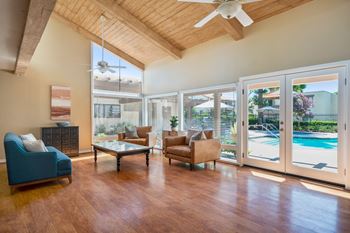 Community clubhouse with tv, living & dining areas