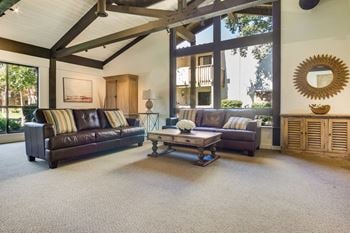 Community clubhouse with tv, living & dining areas