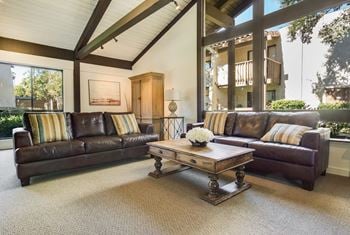 Community clubhouse with tv, living & dining areas