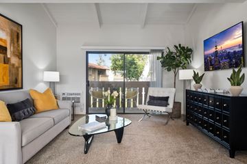 Laguna Hills apartment for rent - a living room with a couch and a coffee table