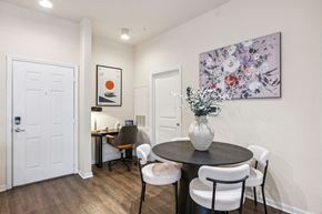 Gainesville apartment for rent - A dining room with a table and chairs.