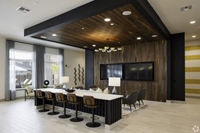 West Melbourne apartment for rent - a conference room with a long table and chairs and a tv