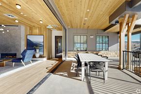Eagle apartment for rent - A modern dining area with a wooden table and chairs.