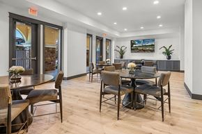 Roseville townhouse for rent - A dining room with a table and chairs.