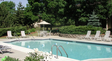 Greenfield apartment for rent - A pool with a gazebo in the background.
