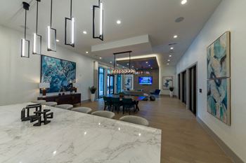 Clubhouse interior with marble kitchen island