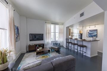Jacksonville apartment for rent - a living room with a couch and a table