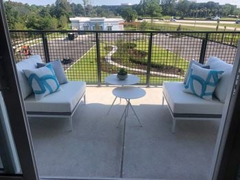 Balcony seating area with outdoor furniture