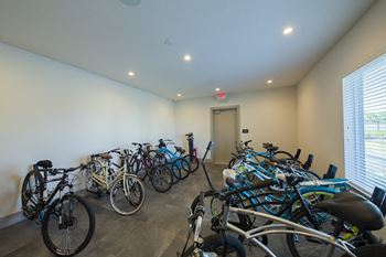 Indoor bicycle storage room with bike racks