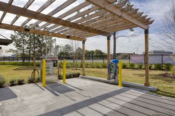 Car wash station with wooden pergola
