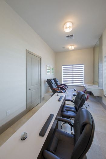 Nail salon with pedicure chairs and foot baths