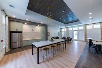 Nathan ridge apartments - clubroom with kitchen and tvs