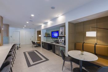 Community clubhouse with kitchen and dining area