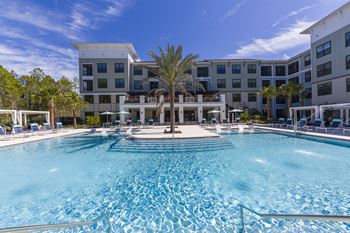 Resort style swimming pool with central fountain
