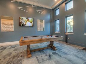 St Augustine apartment for rent - a pool table in a game room with windows