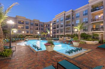 Pool with sundeck and lounge seating