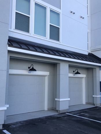 Two car garage with overhead lighting