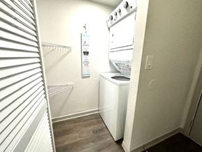 Palm Bay apartment for rent - a small kitchen with a stove and a refrigerator