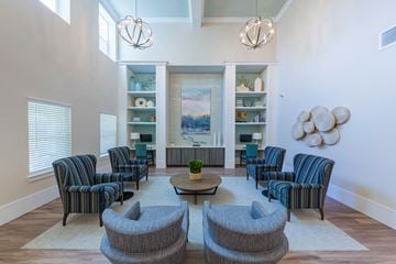 Pensacola apartment for rent - a living room with chairs and a table