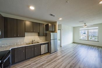 Lofts at jefferson station kitchen with stainless steel appliances