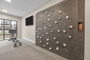 A wall with a climbing wall 