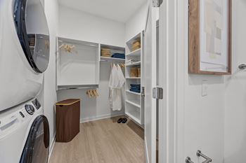 Walk-in closets designed with built-in shelving for easy organization