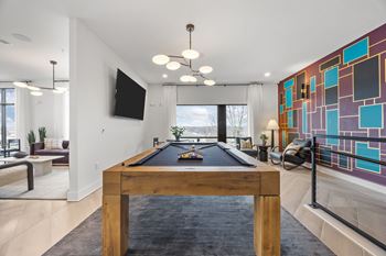 A pool table in a room 