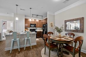 Clayton apartment for rent - kitchen and dining room at The Arbors at East Village, Clayton, NC, 27527