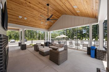 A patio with a ceiling fan