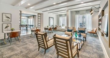 Melbourne apartment for rent - a living room and dining room with tables and chairs