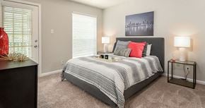 Henrico apartment for rent - a bedroom with a bed and a window
