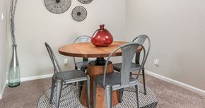 Henrico apartment for rent - a dining room with a table and chairs