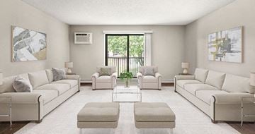 Burnsville apartment for rent - a living room with couches and chairs and a table