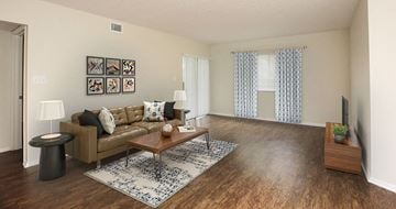 Deerfield Beach apartment for rent - a living room with a couch and a table
