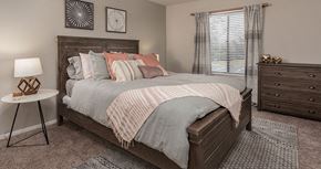 Richmond apartment for rent - a bedroom with a bed and a window