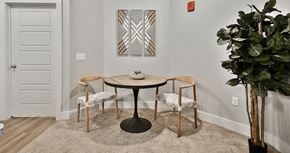 Papillion apartment for rent - a dining room with a table and three chairs