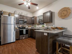 Oklahoma City apartment for rent - a kitchen with stainless steel appliances and a counter top