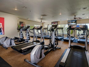 Rogers apartment for rent - a gym with treadmills and other exercise equipment