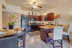 Stillwater apartment for rent - a kitchen and dining area with a dining table and chairs