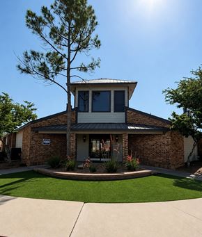 Midland apartment for rent - A house with a tree in front of it.