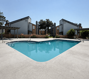 Midland apartment for rent - A swimming pool in front of a house.