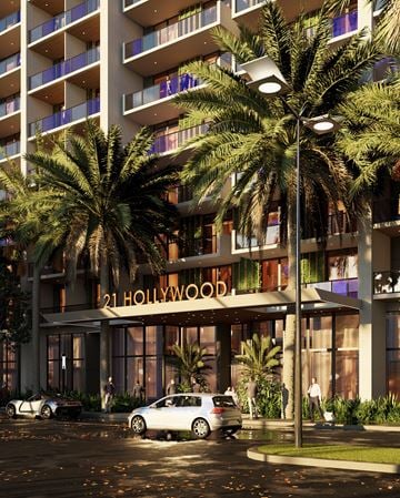Hollywood apartment for rent - A white car is parked in front of a building with the sign "21 Hollywood".