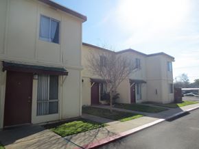 Sacramento townhouse for rent - Building with a sidewalk in front of it at American River Gardens, Sacramento, California 