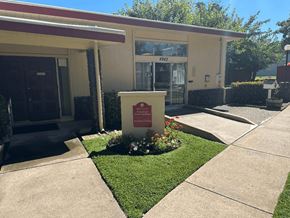 Sacramento townhouse for rent - A building with a sign in front of it.